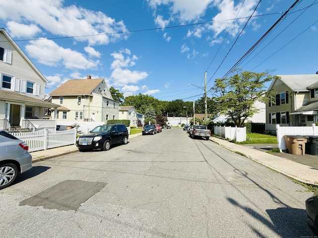 75 Frank St, Stamford, CT 06902 - view of asphalt road with a residential view, sidewalks, curbs, and street lighting