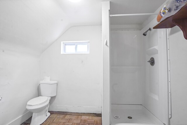 165 Connecticut Ave, New London, CT 06320 - bathroom with lofted ceiling, a shower stall, baseboards, and toilet