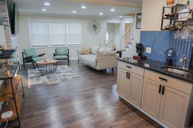 381 Oak St, East Hartford, CT 06118 - living room featuring crown molding, stairway, dark wood-style flooring, recessed lighting, and baseboards