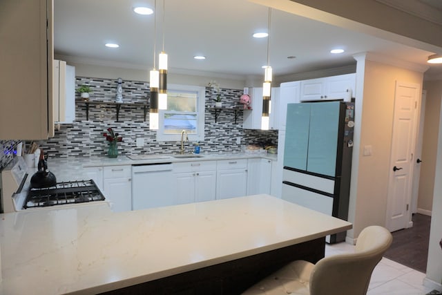 381 Oak St, East Hartford, CT 06118 - kitchen featuring white appliances, crown molding, a sink, backsplash, and a peninsula