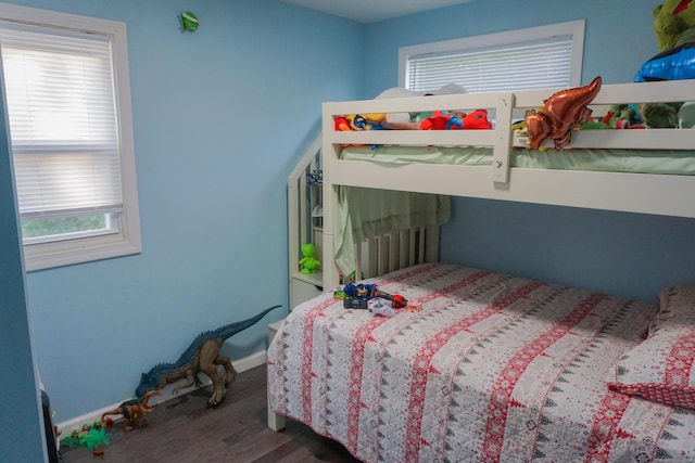 381 Oak St, East Hartford, CT 06118 - bedroom featuring wood finished floors and baseboards
