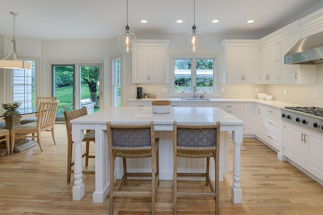 38 Old Trolley Rd, Ridgefield, CT 06877 - kitchen with stainless steel gas stovetop, recessed lighting, a sink, light countertops, and decorative backsplash