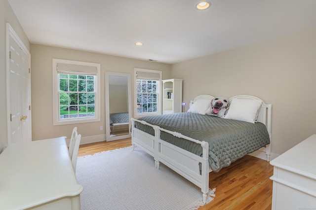 38 Old Trolley Rd, Ridgefield, CT 06877 - bedroom with light wood-style flooring, recessed lighting, and baseboards