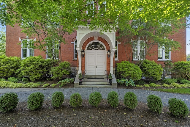 25 Orchard St Unit 14, Stonington, CT 06378 - doorway to property featuring brick siding