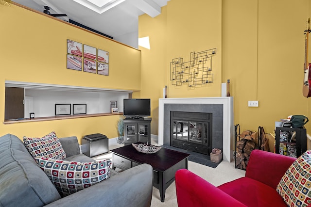 25 Orchard St Unit 14, Stonington, CT 06378 - carpeted living area with a fireplace and a towering ceiling