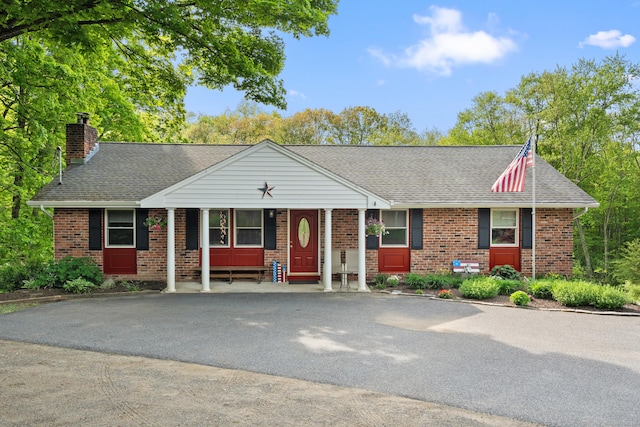 2 Pine Hill Rd, New Fairfield, CT 06812 - single story home featuring brick siding, a shingled roof, and a chimney