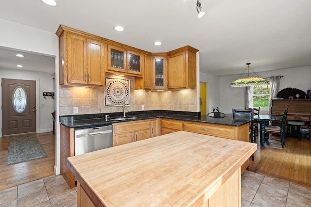 2 Pine Hill Rd, New Fairfield, CT 06812 - kitchen with stainless steel dishwasher, a sink, tasteful backsplash, glass insert cabinets, and recessed lighting