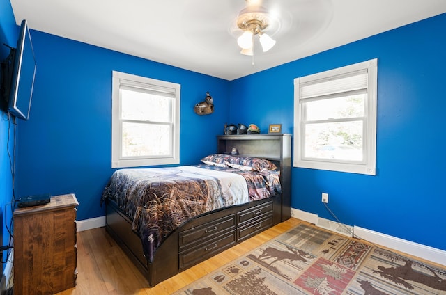 2 Pine Hill Rd, New Fairfield, CT 06812 - bedroom featuring multiple windows, wood finished floors, and baseboards