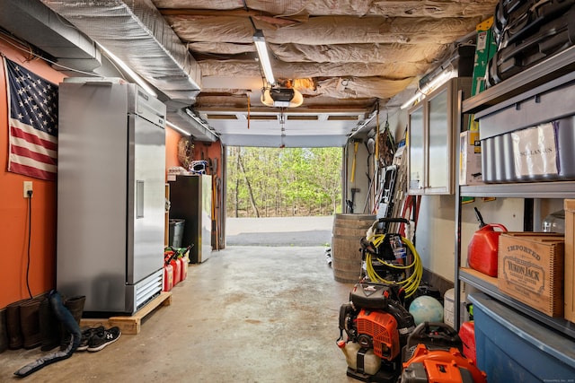 2 Pine Hill Rd, New Fairfield, CT 06812 - garage featuring a garage door opener, water heater, and freestanding refrigerator