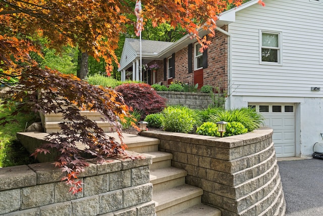 2 Pine Hill Rd, New Fairfield, CT 06812 - view of front of property with an attached garage and brick siding