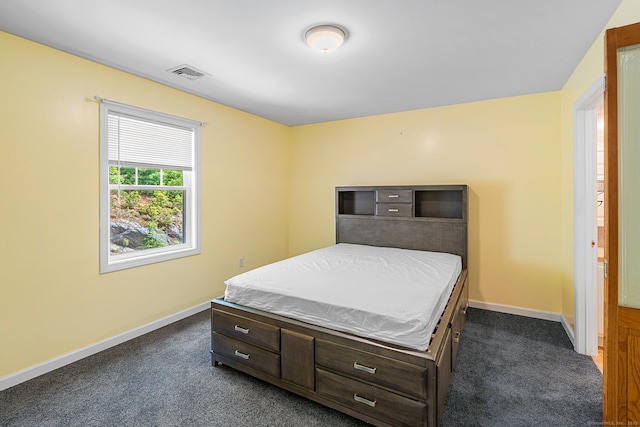 142 Summit St Unit 142, Norwich, CT 06360 - bedroom with dark colored carpet and baseboards