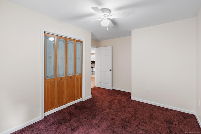 142 Summit St Unit 142, Norwich, CT 06360 - unfurnished bedroom with dark colored carpet, baseboards, and a ceiling fan