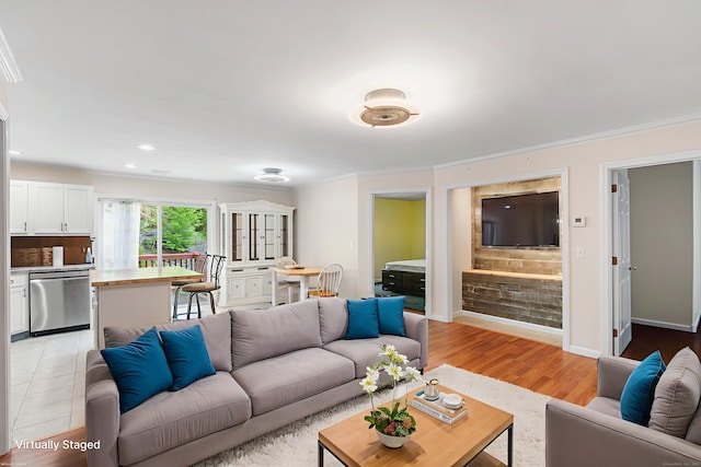 142 Summit St Unit 142, Norwich, CT 06360 - living room featuring ornamental molding, light wood finished floors, and baseboards