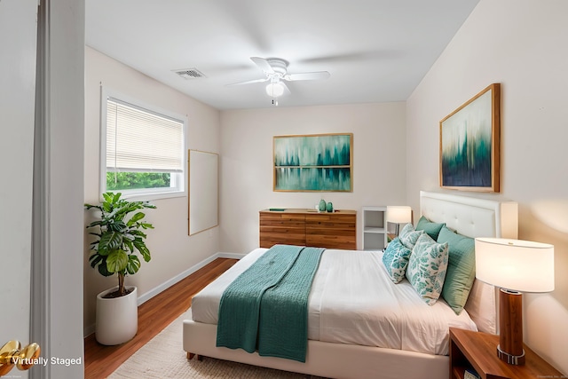 142 Summit St Unit 142, Norwich, CT 06360 - bedroom featuring wood finished floors, baseboards, and a ceiling fan