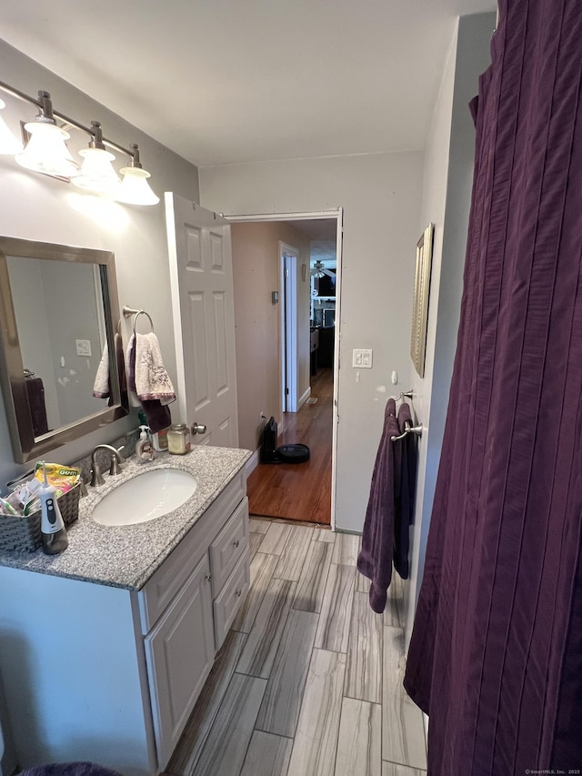 39 Eastwood Rd, Bristol, CT 06010 - bathroom featuring vanity and wood finished floors