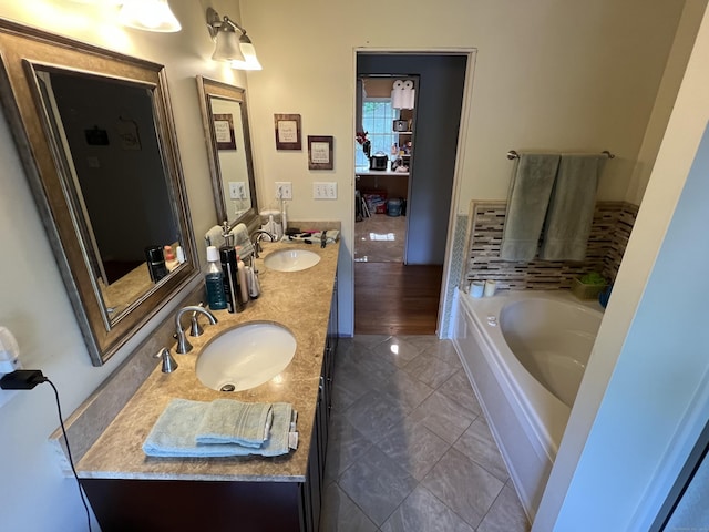 39 Eastwood Rd, Bristol, CT 06010 - bathroom featuring double vanity and a garden tub