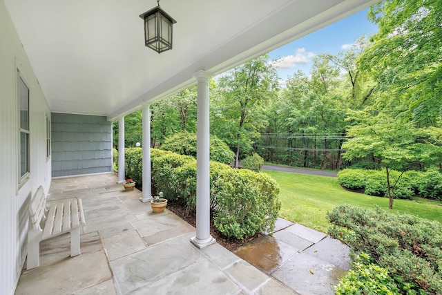 6 Rivergate Woods, Wilton, CT 06897 - covered porch featuring a lawn