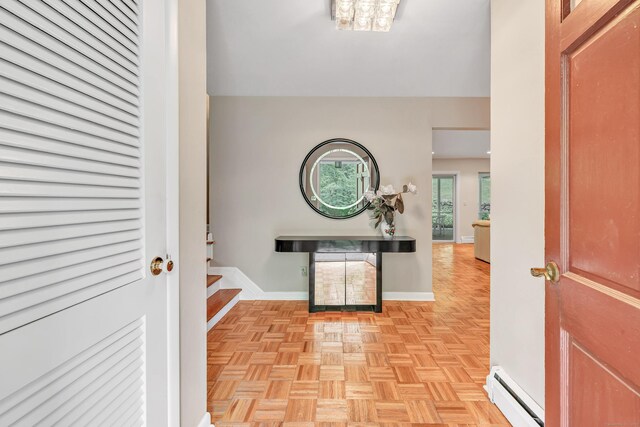 6 Rivergate Woods, Wilton, CT 06897 - foyer entrance featuring baseboard heating, stairway, and baseboards