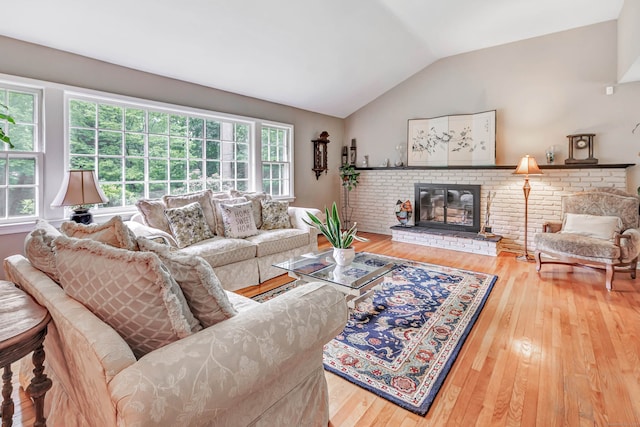 6 Rivergate Woods, Wilton, CT 06897 - living room with vaulted ceiling, hardwood / wood-style floors, and a brick fireplace