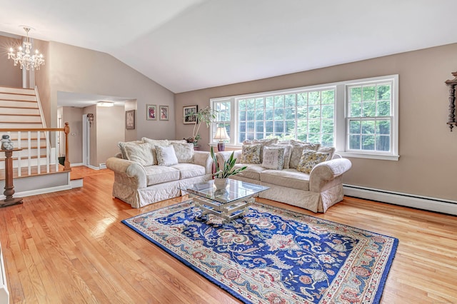 6 Rivergate Woods, Wilton, CT 06897 - living room with a baseboard heating unit, wood finished floors, lofted ceiling, stairway, and a chandelier