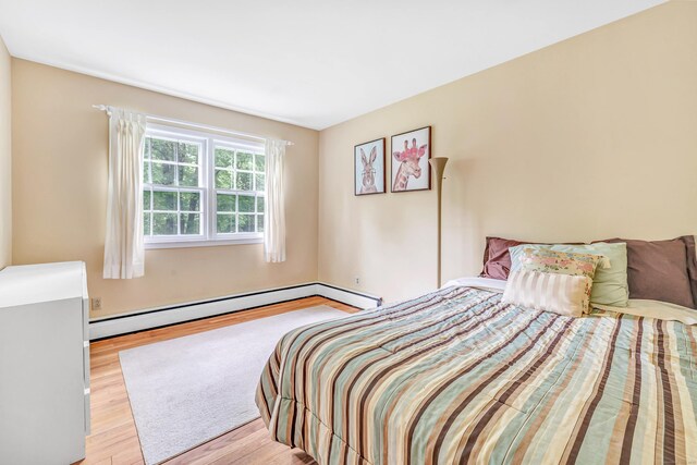 6 Rivergate Woods, Wilton, CT 06897 - bedroom with wood finished floors and baseboard heating