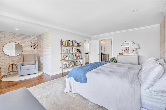40 Temple Ct Unit 40, New Haven, CT 06511 - bedroom with wood finished floors, crown molding, brick wall, and ensuite bath