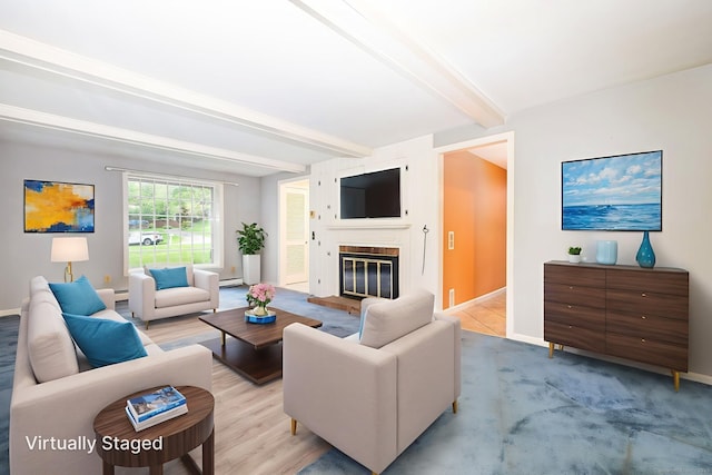 10 Laurel Glen Dr, East Hampton, CT 06424 - living room with beam ceiling, baseboards, and a glass covered fireplace