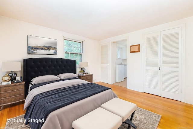 10 Laurel Glen Dr, East Hampton, CT 06424 - bedroom with wood finished floors and washer / dryer