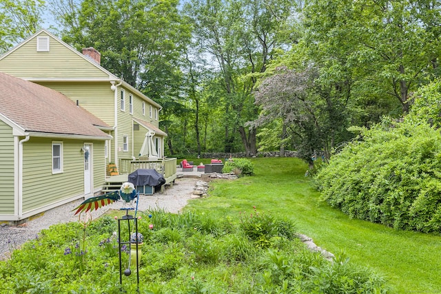 103 Pine St, Columbia, CT 06237 - view of green lawn featuring a deck and view of scattered trees