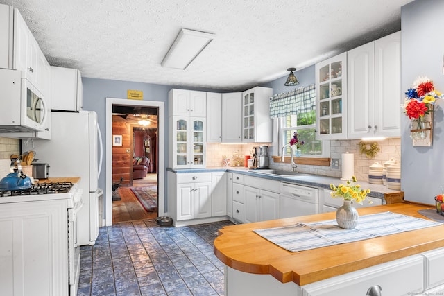 103 Pine St, Columbia, CT 06237 - kitchen featuring white appliances, a sink, glass insert cabinets, backsplash, and a textured ceiling