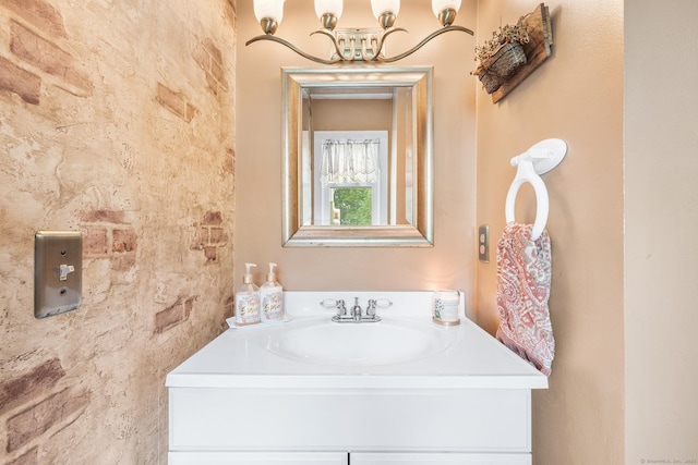 103 Pine St, Columbia, CT 06237 - bathroom featuring vanity and a chandelier