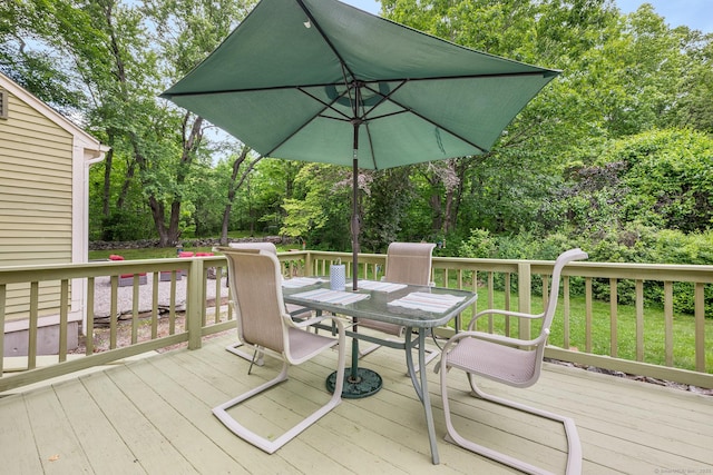 103 Pine St, Columbia, CT 06237 - wooden terrace with outdoor dining area and view of scattered trees