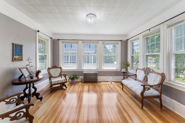 90 Broad St, Killingly, CT 06239 - sunroom with radiator and a chandelier