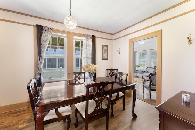 90 Broad St, Killingly, CT 06239 - dining area featuring wood finished floors and ornamental molding