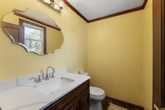 90 Broad St, Killingly, CT 06239 - half bathroom featuring vanity, wood finished floors, and crown molding