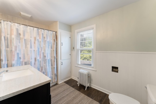 90 Broad St, Killingly, CT 06239 - full bathroom with radiator, wood finished floors, vanity, a wainscoted wall, and a shower with curtain