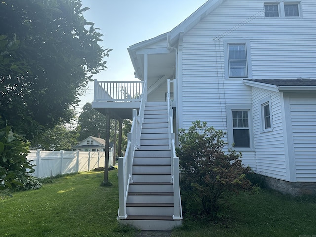 90 Broad St, Killingly, CT 06239 - view of home's exterior featuring stairs and a wooden deck