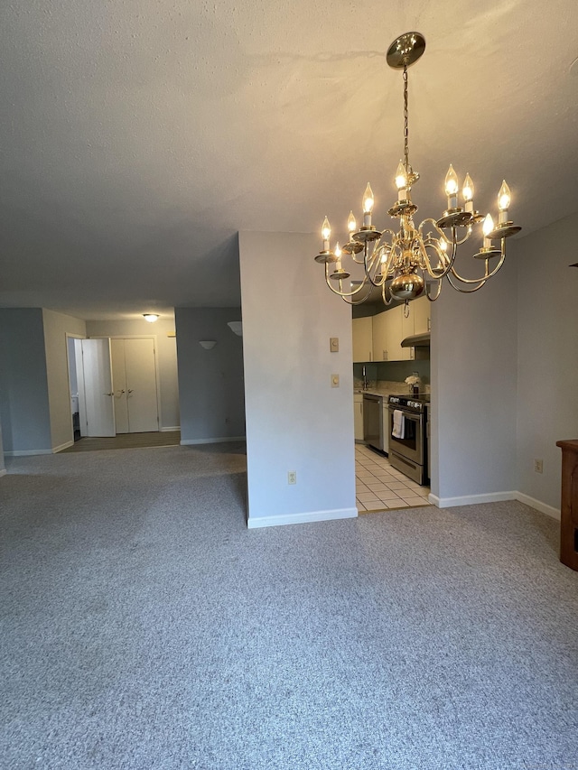 782 Oronoke Rd Apt 33, Waterbury, CT 06708 - unfurnished living room with a chandelier, baseboards, and light carpet
