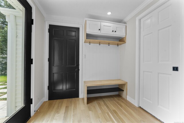 193 Stoner Dr, West Hartford, CT 06107 - mudroom featuring light wood-type flooring, ornamental molding, and recessed lighting