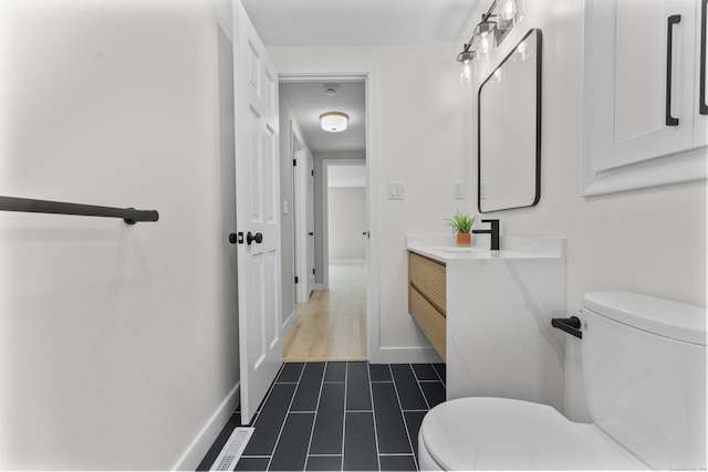 193 Stoner Dr, West Hartford, CT 06107 - bathroom with vanity and tile patterned flooring