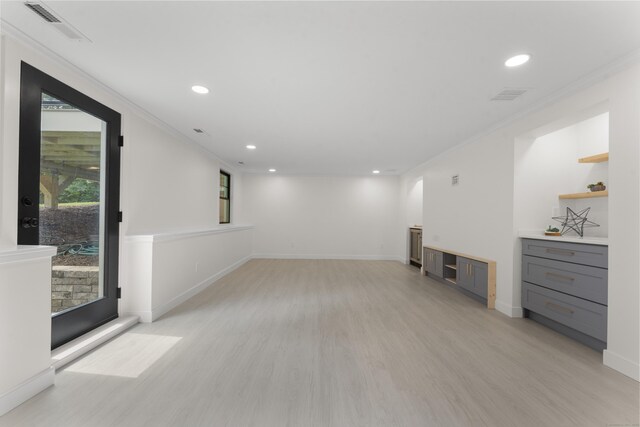 193 Stoner Dr, West Hartford, CT 06107 - unfurnished living room with light wood-style floors, recessed lighting, and ornamental molding