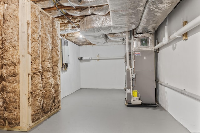193 Stoner Dr, West Hartford, CT 06107 - unfinished basement featuring heating unit and electric panel