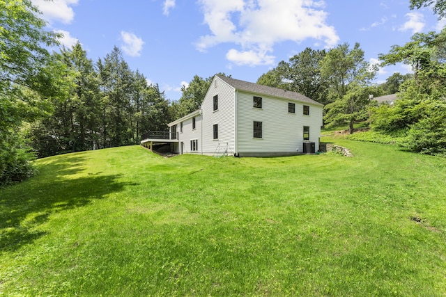 193 Stoner Dr, West Hartford, CT 06107 - view of property exterior with a yard and a wooden deck
