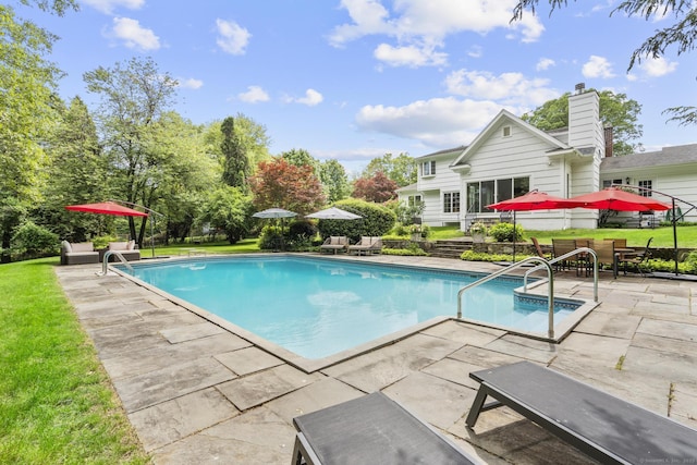 22 Douglas Dr, Norwalk, CT 06850 - swimming pool featuring a patio, a yard, and a hot tub