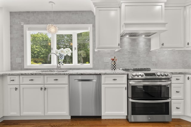 22 Douglas Dr, Norwalk, CT 06850 - kitchen featuring appliances with stainless steel finishes, a sink, and white cabinets