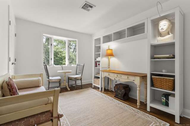 22 Douglas Dr, Norwalk, CT 06850 - living area featuring wood finished floors, baseboards, and built in features