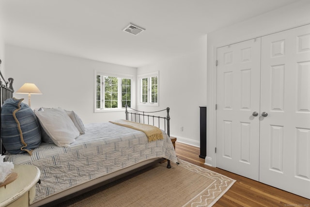 22 Douglas Dr, Norwalk, CT 06850 - bedroom with wood finished floors, baseboards, and a closet