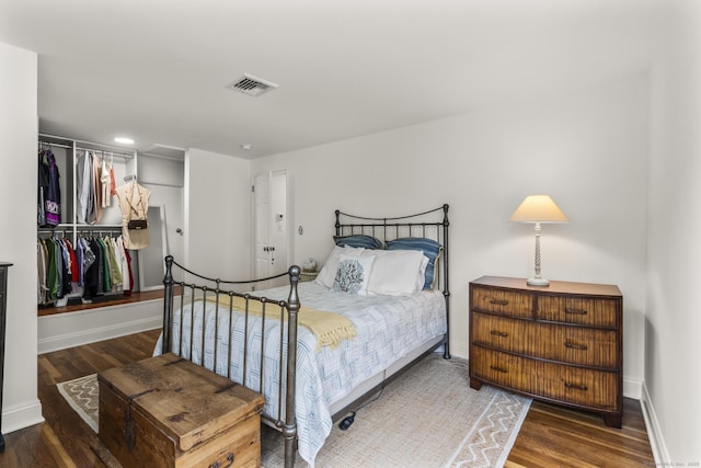 22 Douglas Dr, Norwalk, CT 06850 - bedroom featuring wood finished floors, a closet, and baseboards