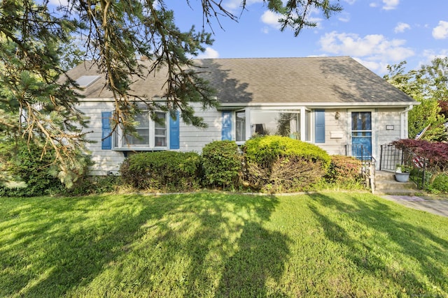 112 Vermont Ave, Stratford, CT 06615 - view of front of house with a front lawn and roof with shingles