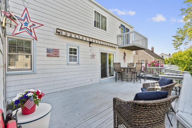 112 Vermont Ave, Stratford, CT 06615 - wooden deck featuring outdoor dining space